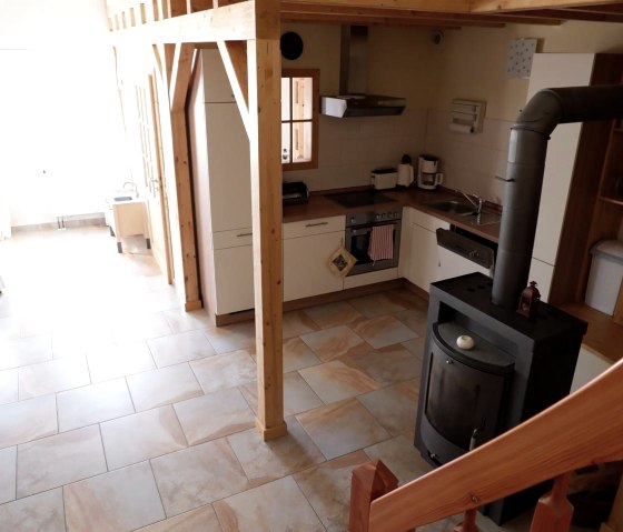 offene Wohnküche mit Kamin offene Wohnküche mit Kamin