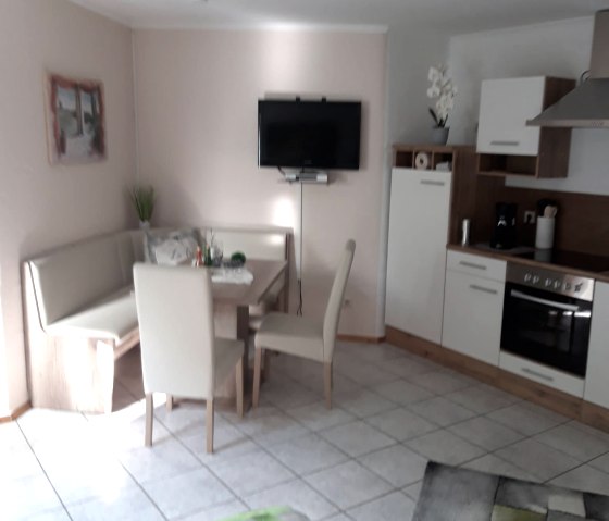 Coin cuisine avec coin repas